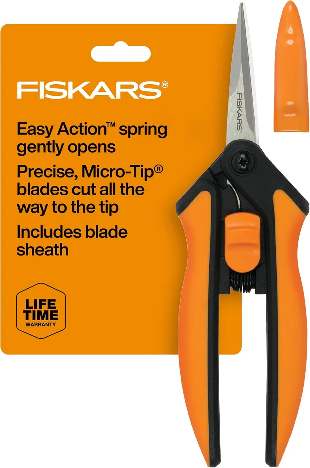 Close-up of compact pruning shears next to a balcony planter